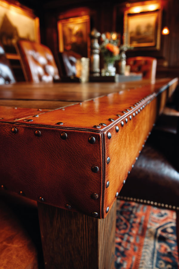 A Table With A Leather-Wrapped Edge Detail A Table With A Leather-Wrapped Edge Detail