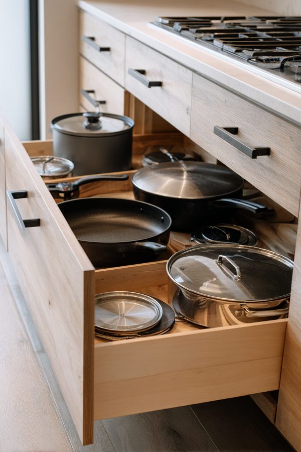 Pull-Out Drawer System In A Kitchen Cabinet